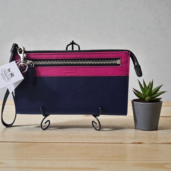 Coach Handbags - COACH Legacy Colorblock Pink and Navy Wristlet
